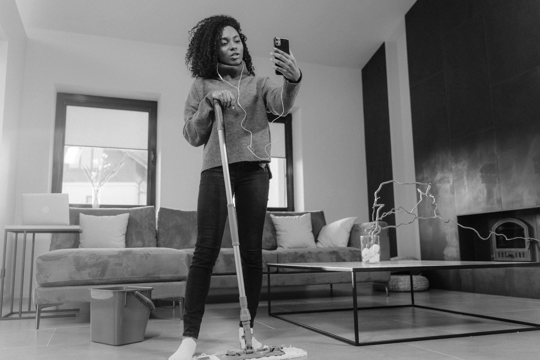 Home cleaning service in Connecticut mopping a tile floor — Weekly Maid Service in Wilton, Fairfield County